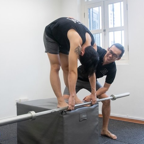 A patient performing resistance training exercises as part of an active loading protocol for long term independence and robustness