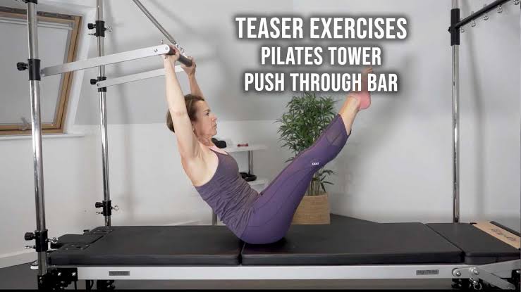 A client performing the Cadillac Teaser exercise to integrate shoulder fixator endurance with deep core and mid-back control.