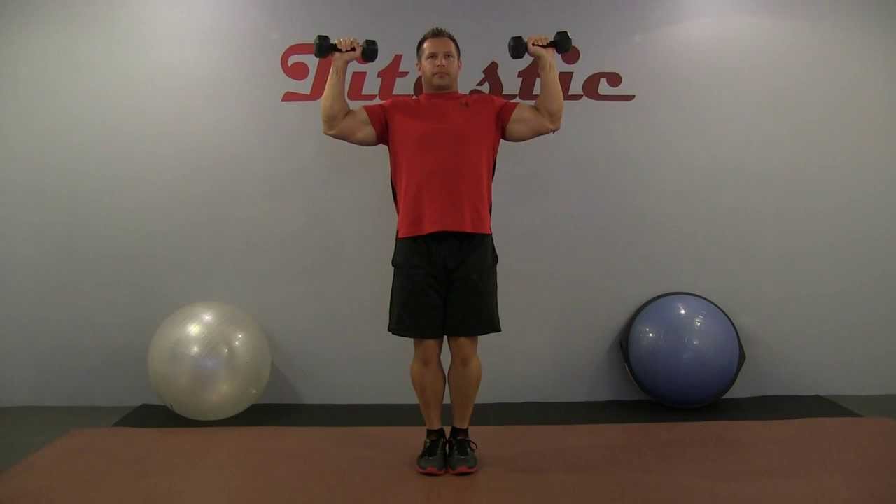 A person performing horizontal flys using light 1 to 2 kg dumbbells to build front delt endurance.